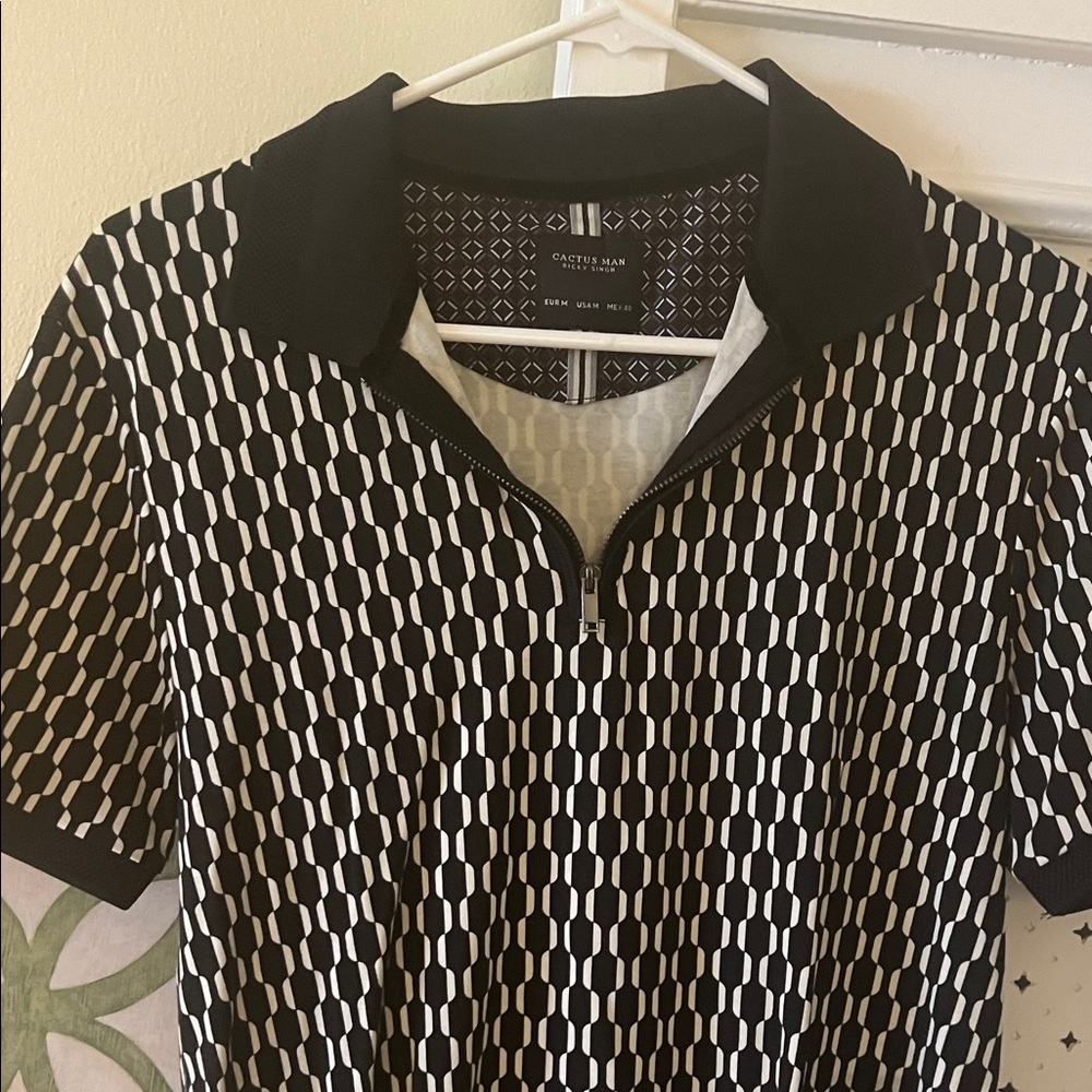 Stylish Black and White Polo 👕